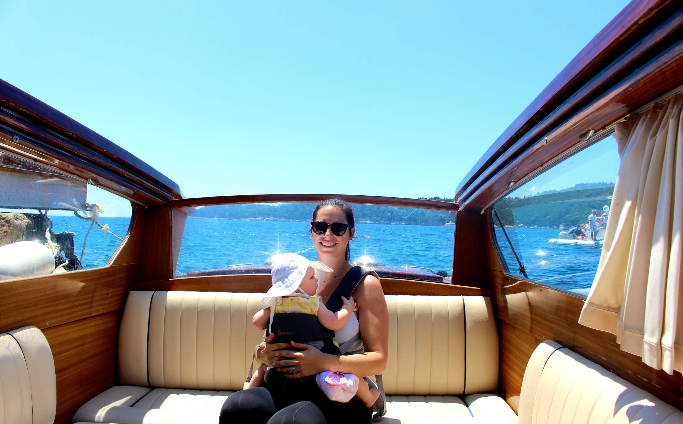 baby travel croatia babywearing on a boat
