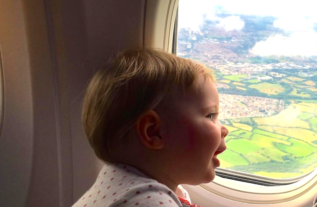 nala-airplane-window baby airplane travel