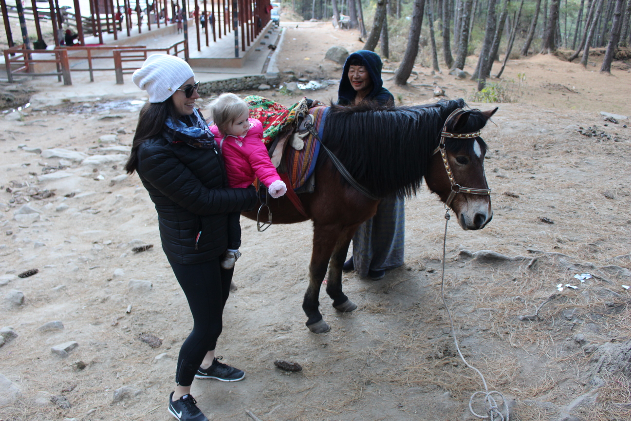 Tigers Nest with a toddler on a mule